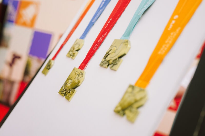 Press conference unveiling the 2026 medal design at the Spice shopping centre