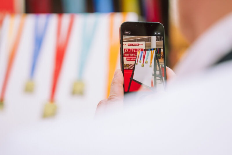 Press conference unveiling the 2026 medal design at the Spice shopping centre
