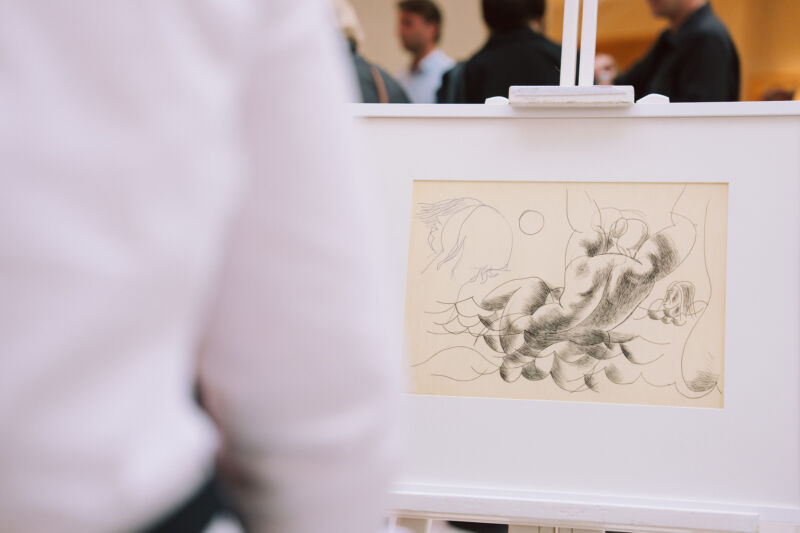 Press conference unveiling the 2026 medal design at the Spice shopping centre