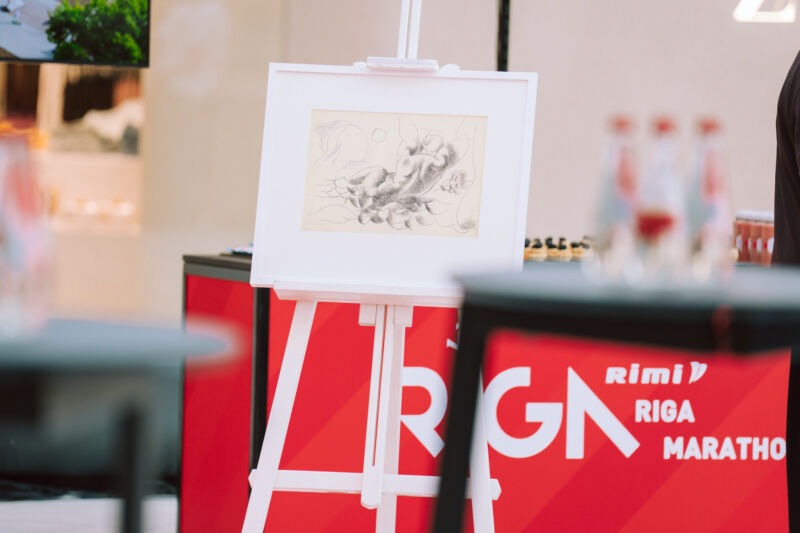 Press conference unveiling the 2026 medal design at the Spice shopping centre