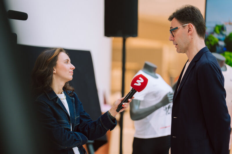 Press conference unveiling the 2026 medal design at the Spice shopping centre