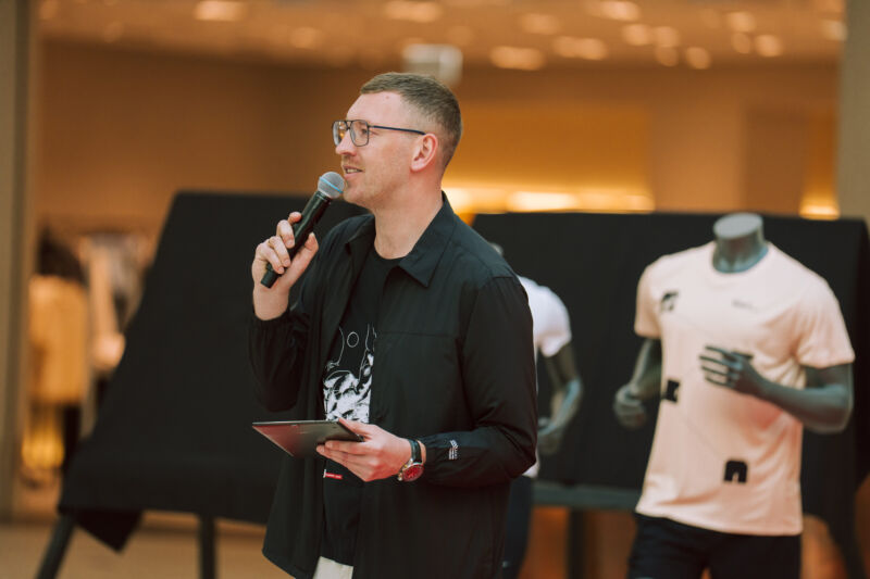 Press conference unveiling the 2026 medal design at the Spice shopping centre